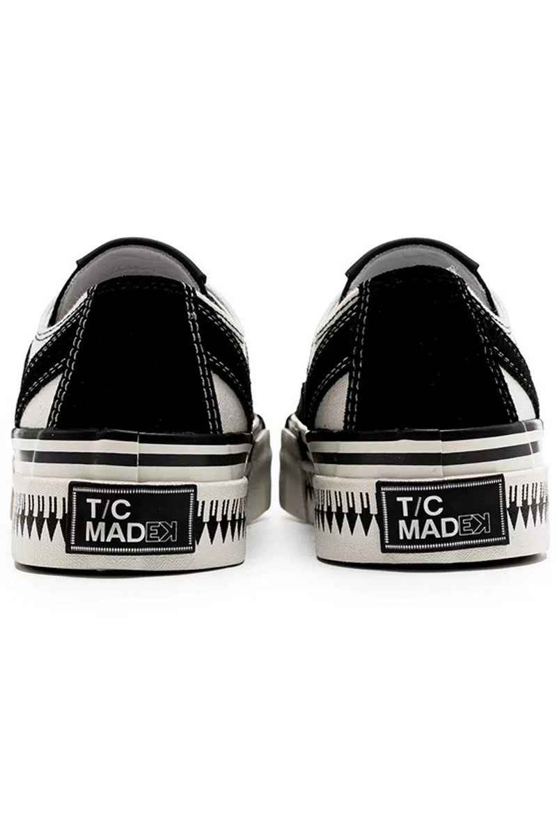 Back view of Black White Platform Canvas Sneakers - ShopLuxury with T/C Madex branding and graphic sole design for a distinctive streetwear edge.