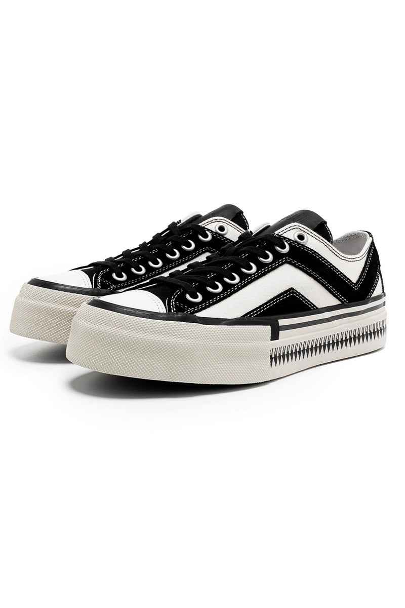 Black White Platform Canvas Sneakers - ShopLuxury featuring bold zigzag side design, thick white sole, and black laces for a modern streetwear look.