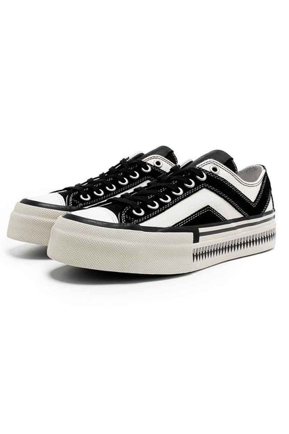 Black White Platform Canvas Sneakers - ShopLuxury featuring bold zigzag side design, thick white sole, and black laces for a modern streetwear look.